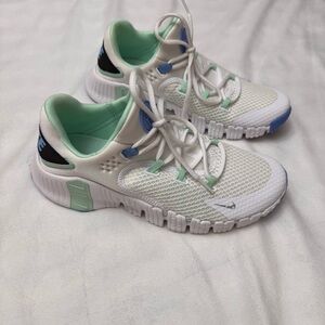 Nike Women’s Metcom 4/ size 9